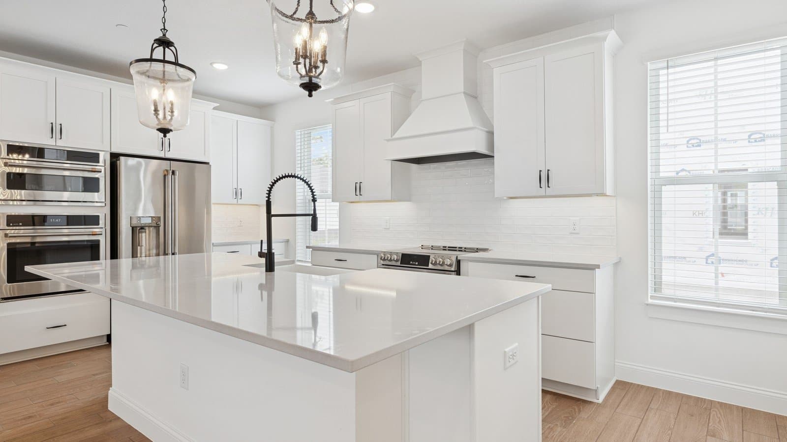 Kitchen with wall oven & stainless steel appliances