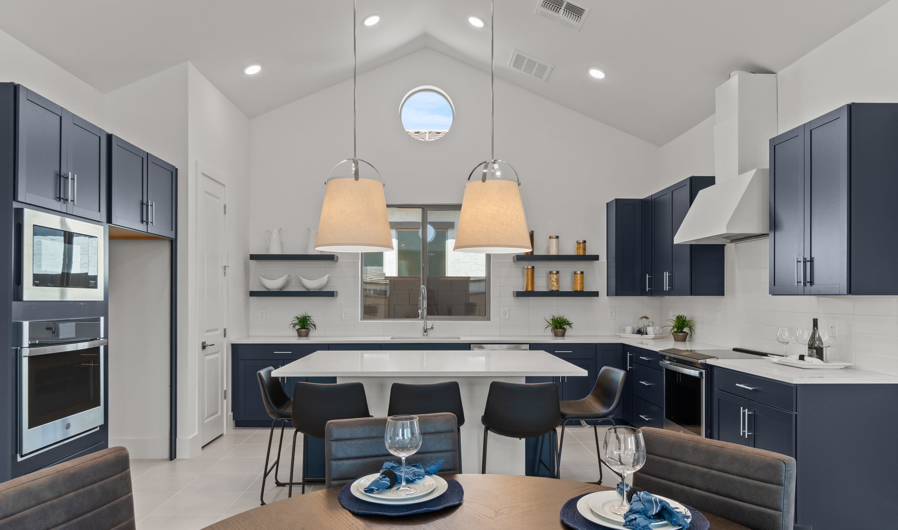Kitchen with deep blue cabinetry
