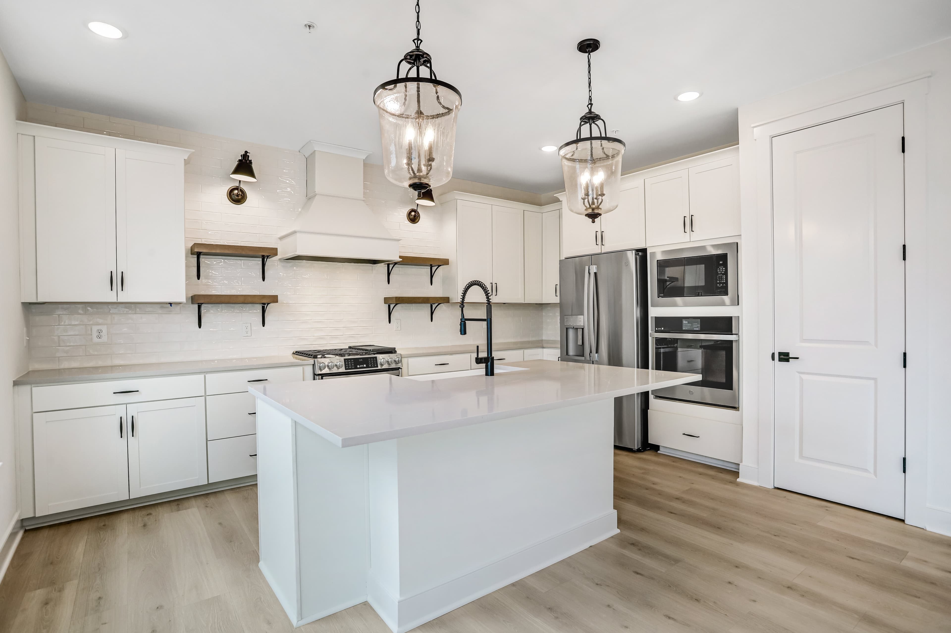 Kitchen with striking pendant lighting