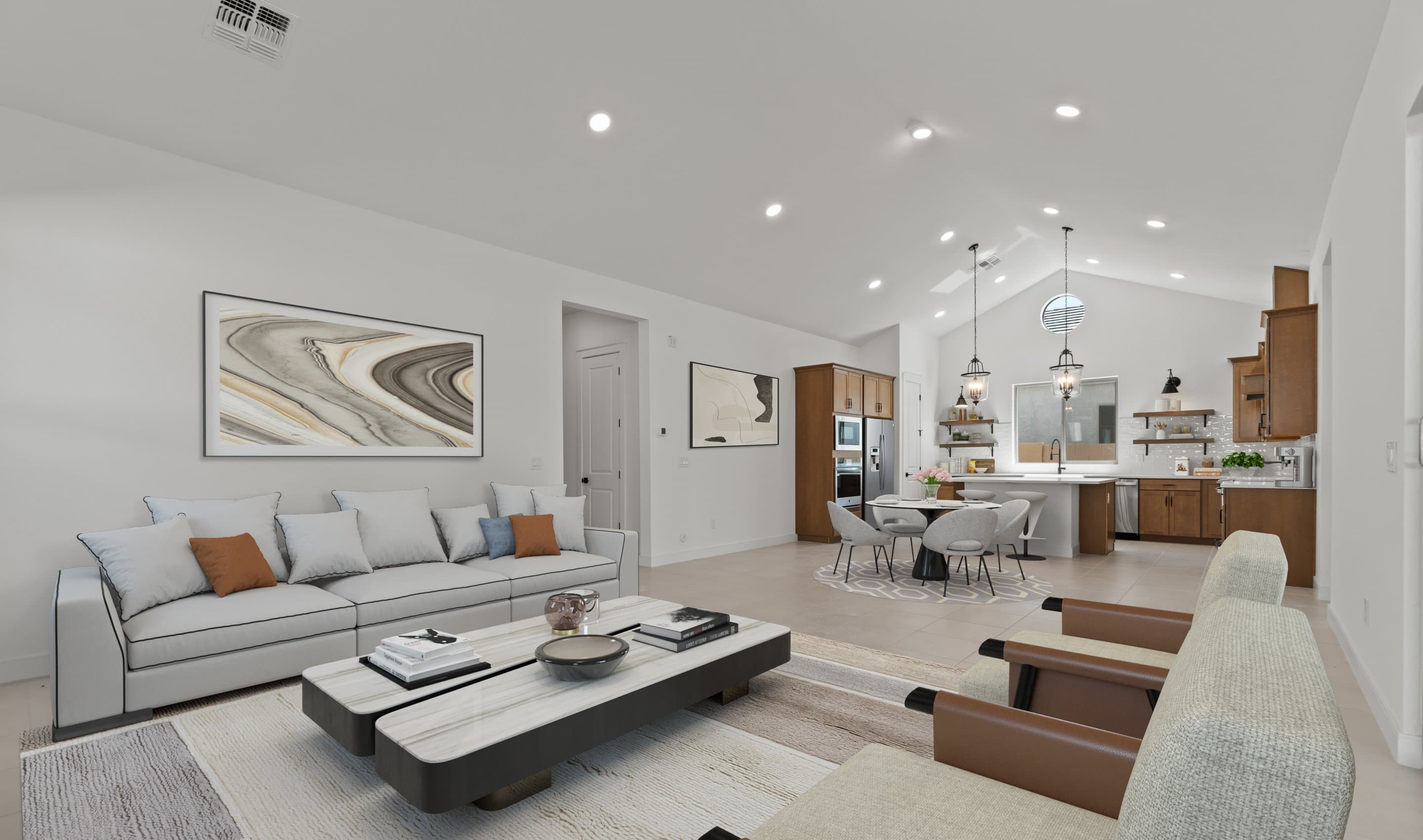 Open concept living spaces with vaulted ceiling
