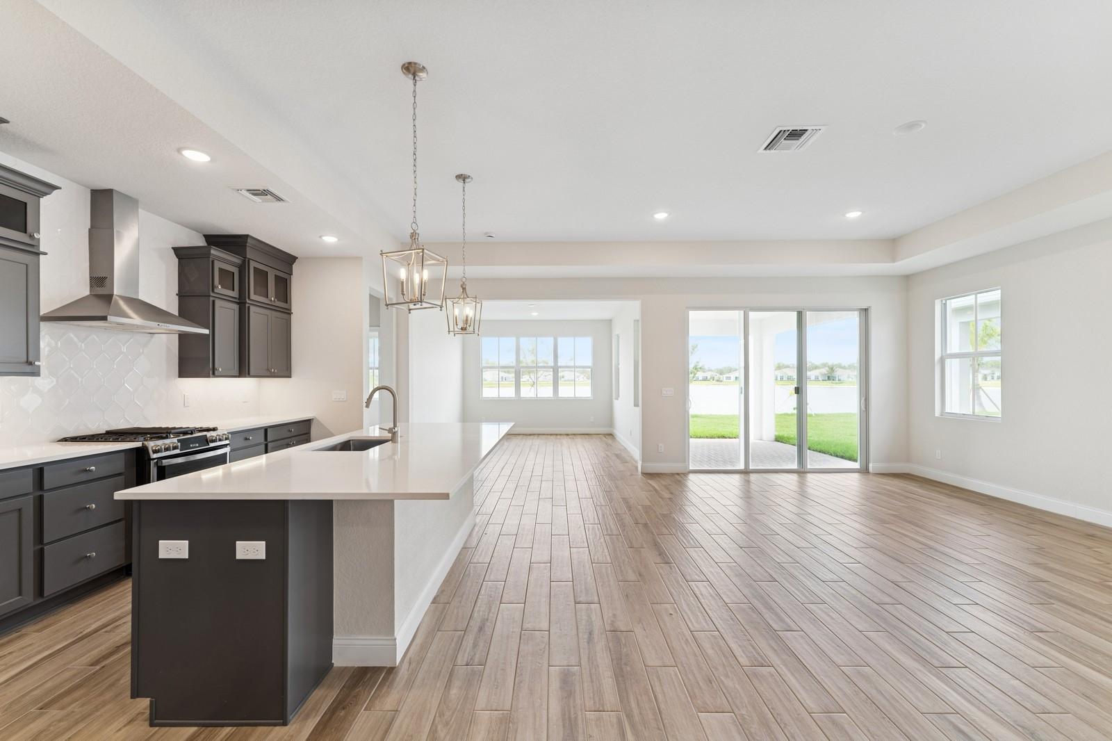 Kitchen with elegant ceiling treatment