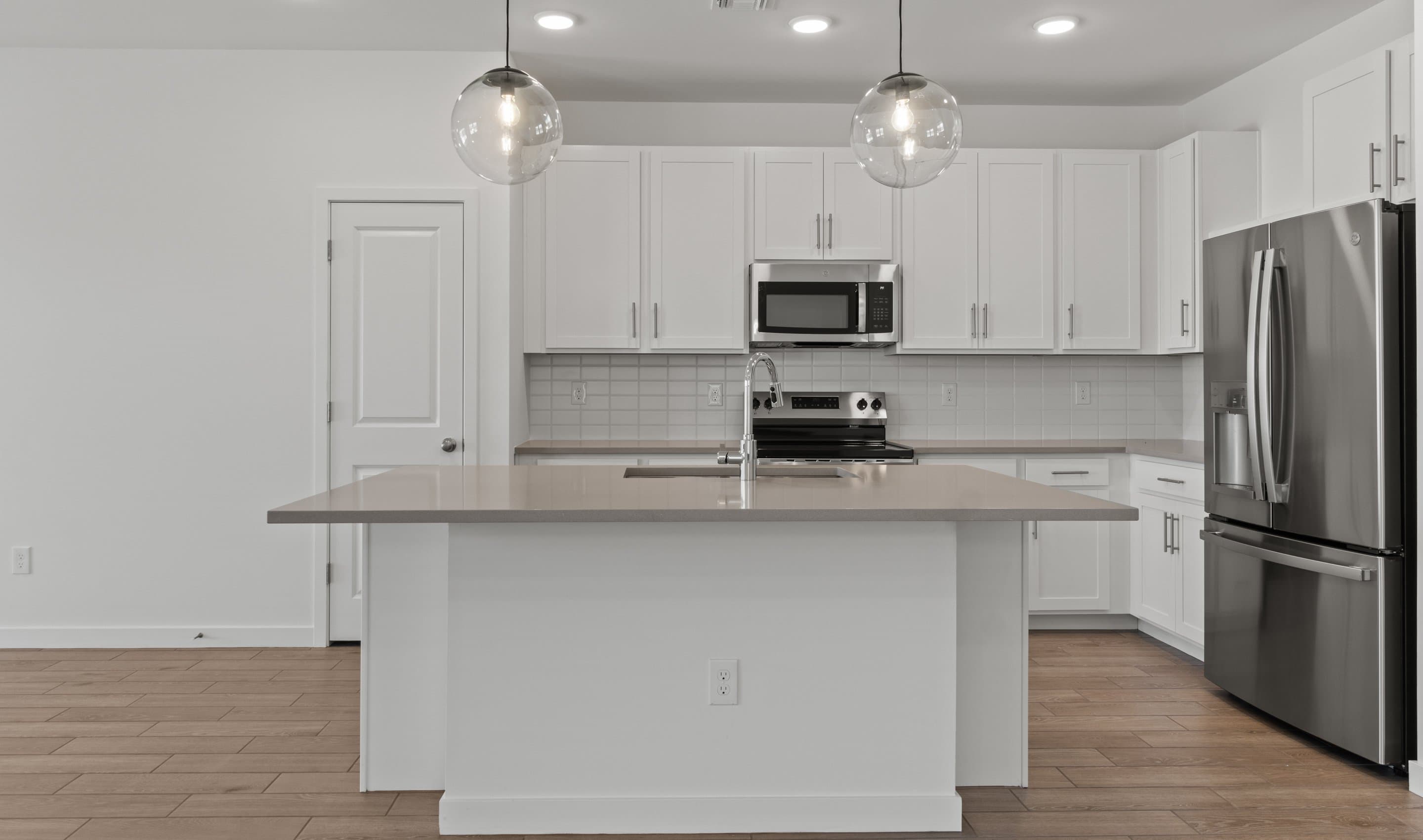 Kitchen with white cabinets