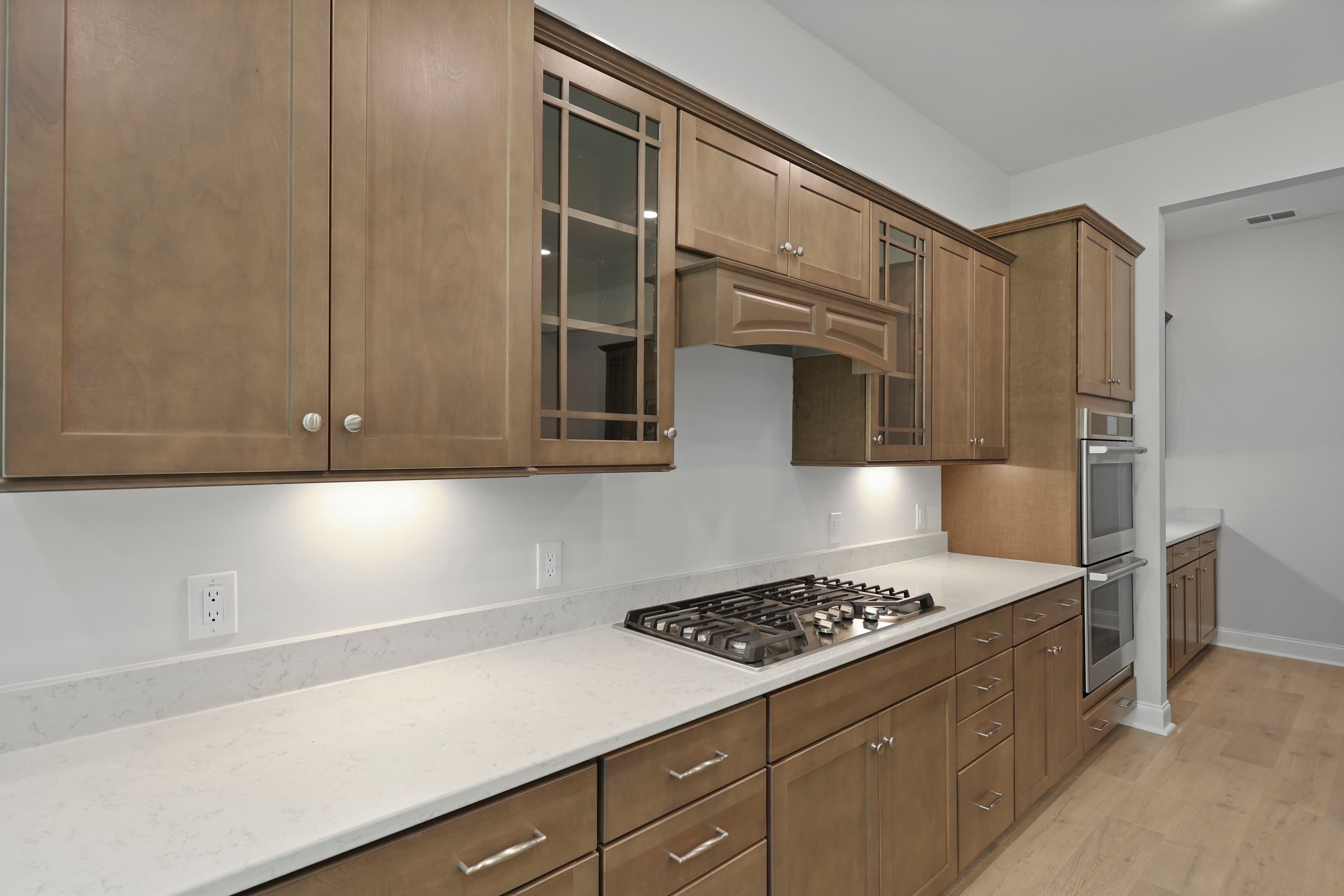 Kitchen with upper glass cabinets