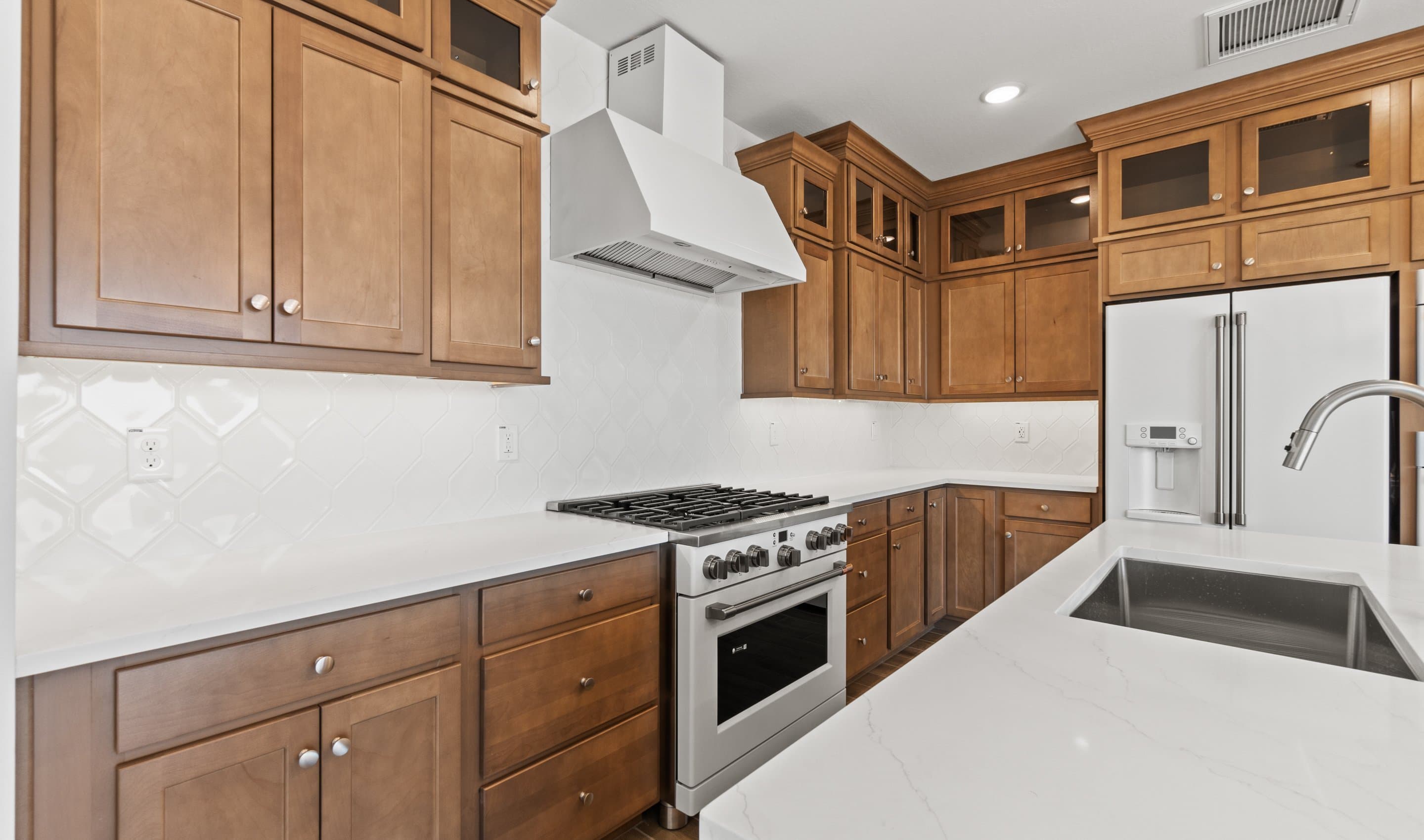Kitchen with upper glass cabinets