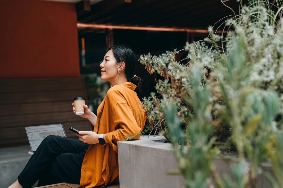 Woman Enjoying Coffee Outside