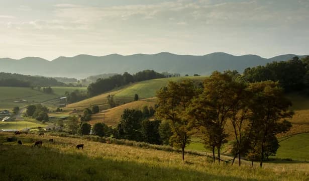 Rolling Hills of Farmland and Mountains