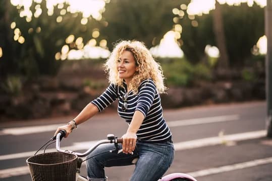 Woman on Bike in Park