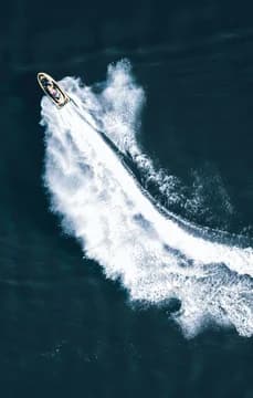 149693 Aerial of Waverunner Jetski on Ocean Water USP Crop