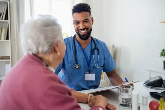 Nurse talking to patient