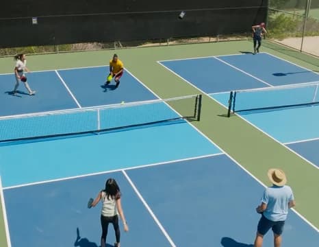 People playing pickleball