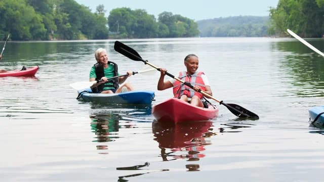 49372_group canoeing along river_CROP