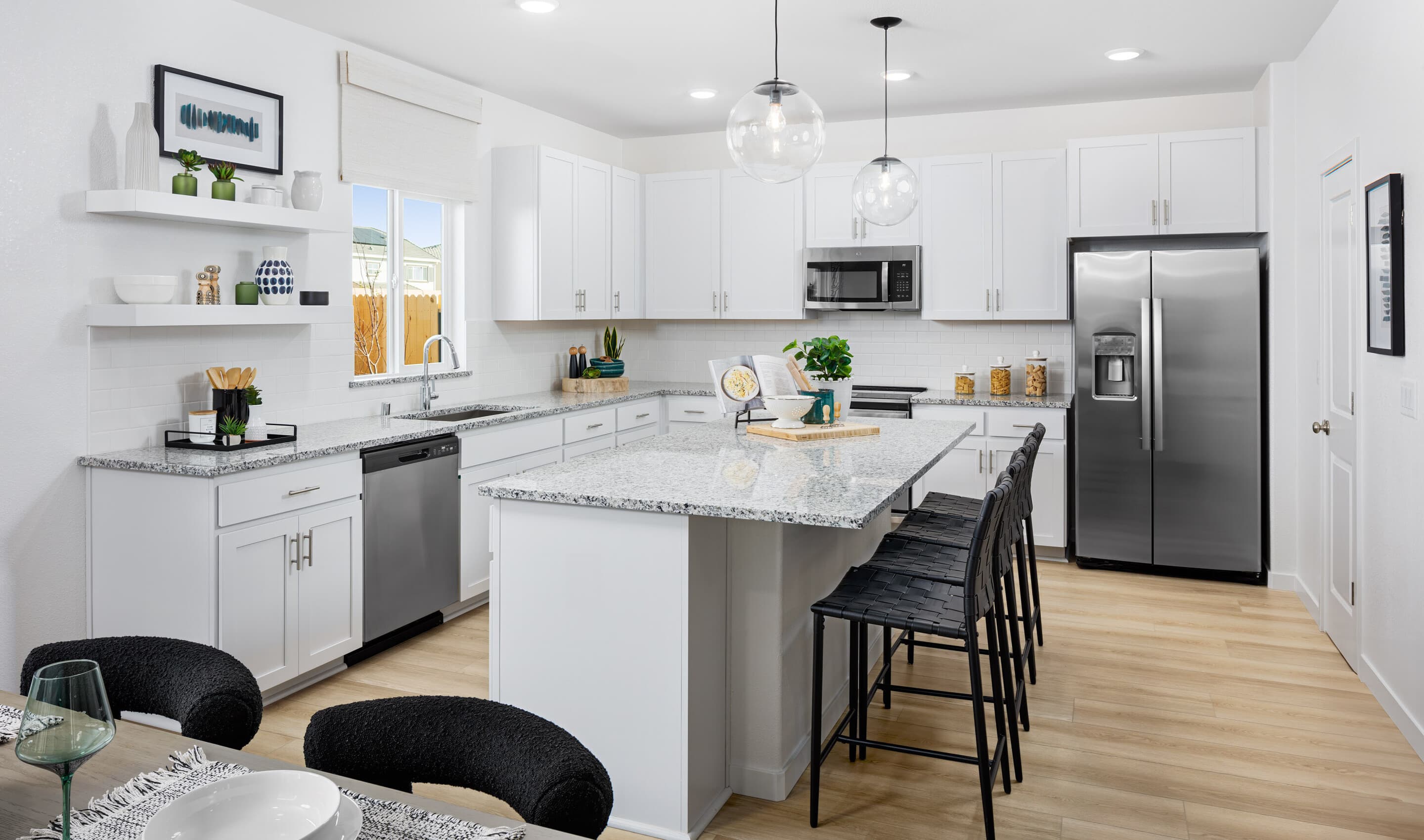 Kitchen with spacious island and pendant lighting