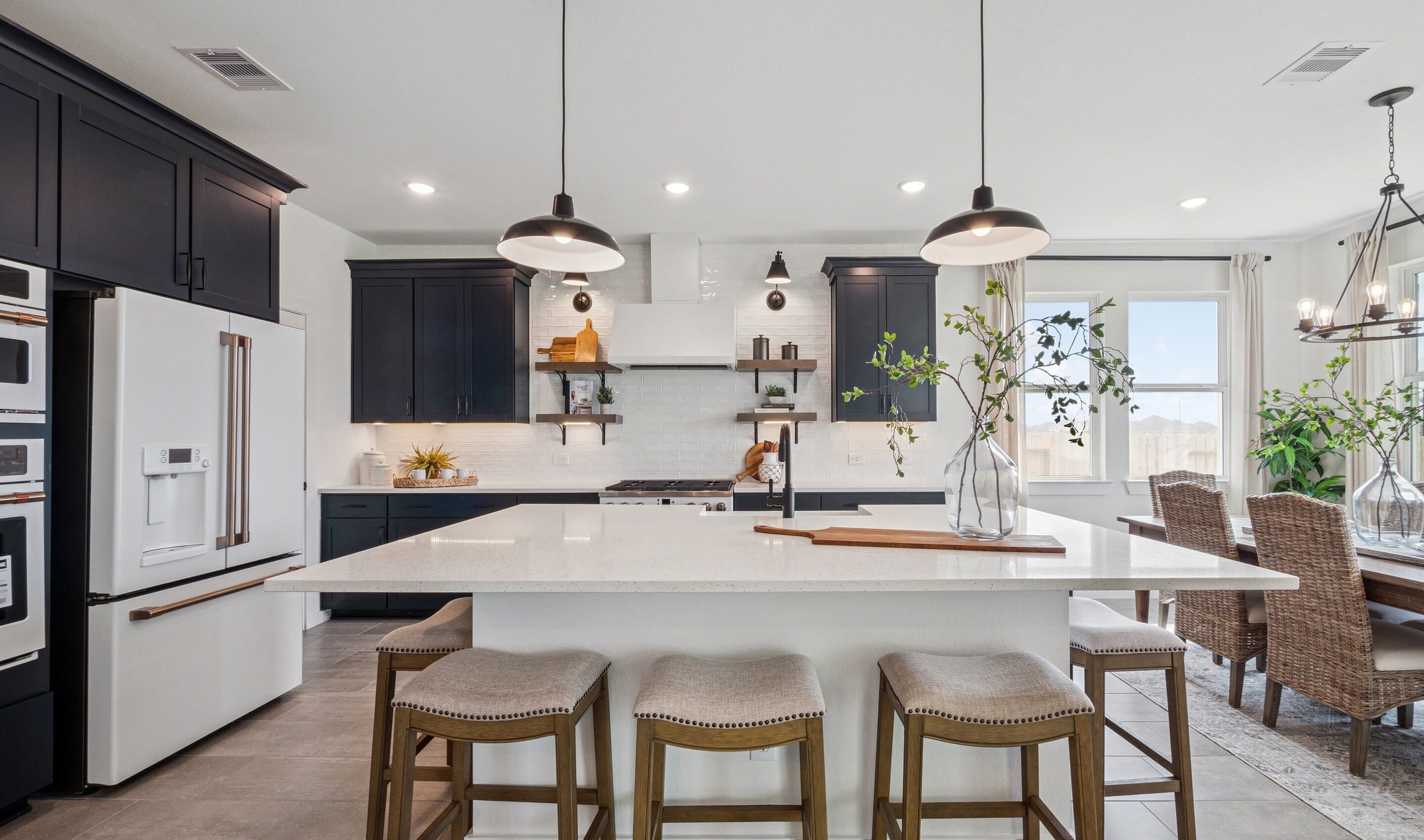 Kitchen with spacious central island & pendant lighting