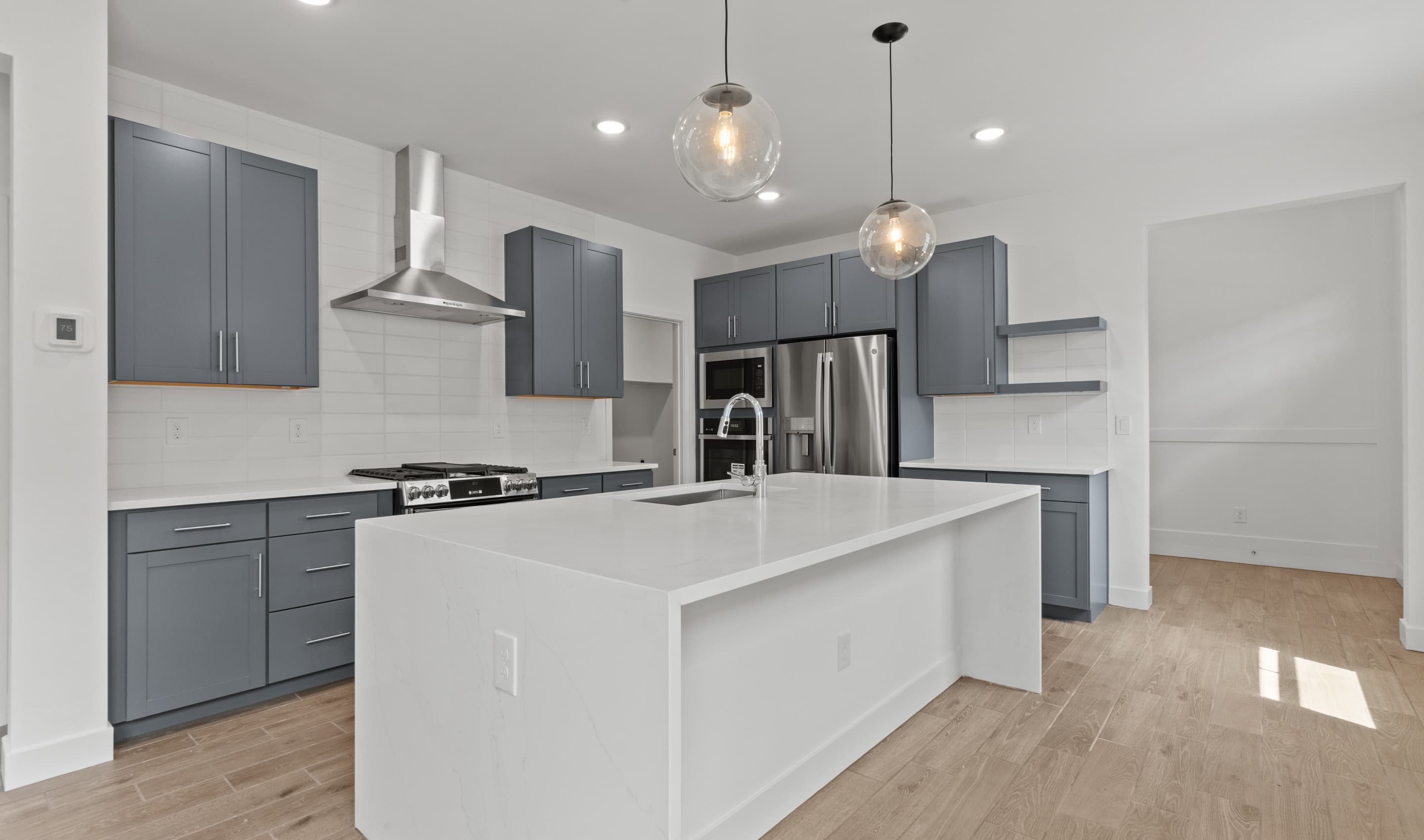 Kitchen with waterfall-edge island