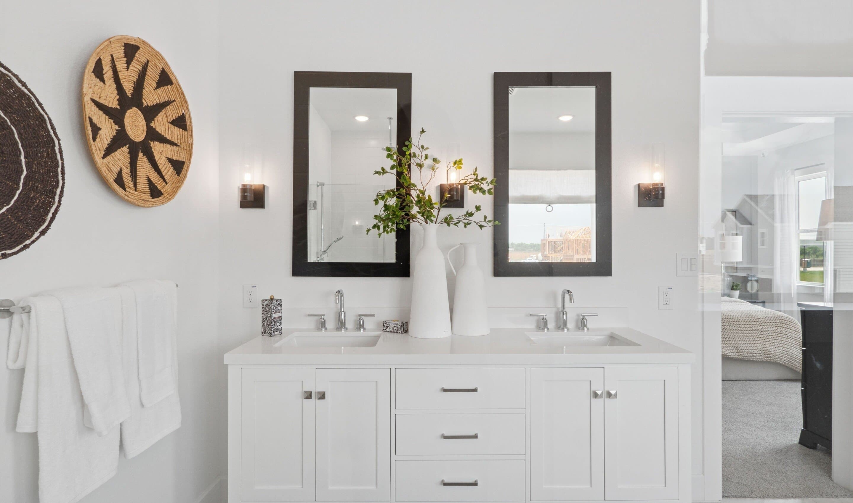 Primary bath with freestanding dual vanity