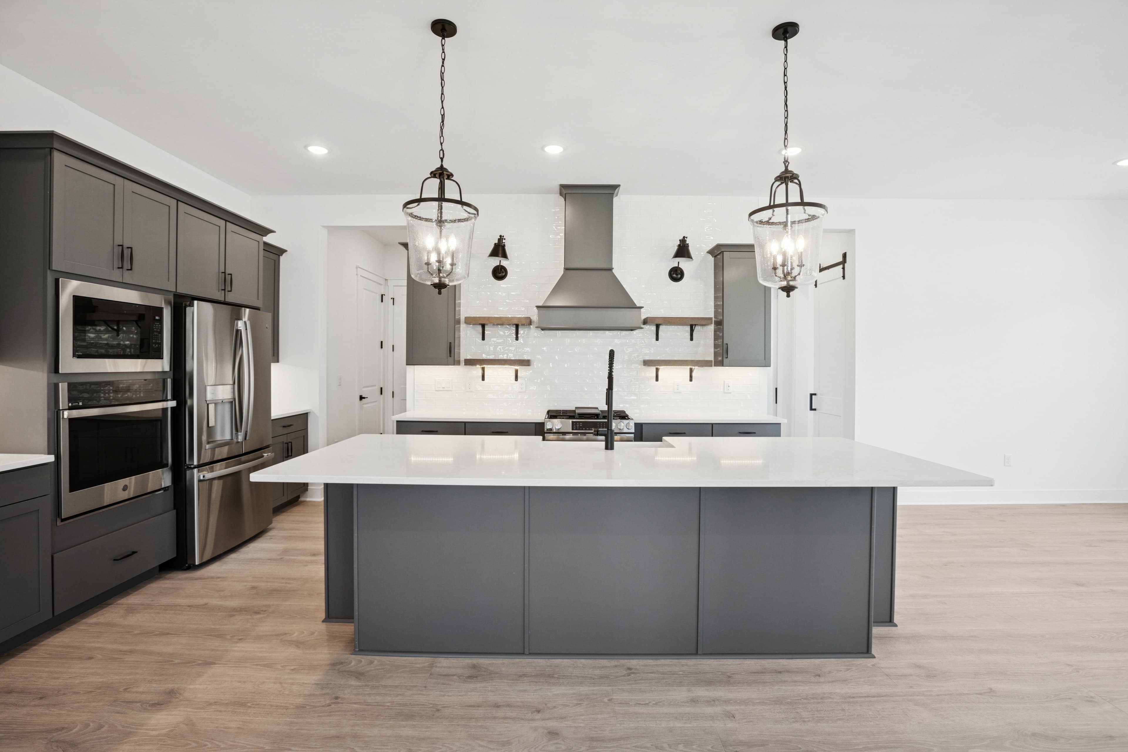 Kitchen with striking pendant lighting