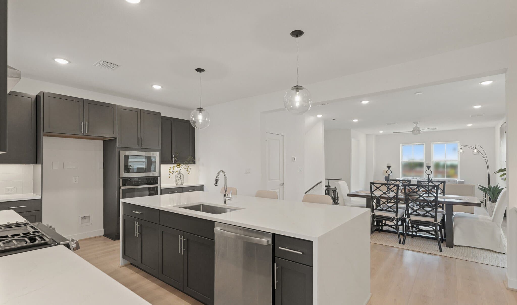 Kitchen with vast island & pendant lights