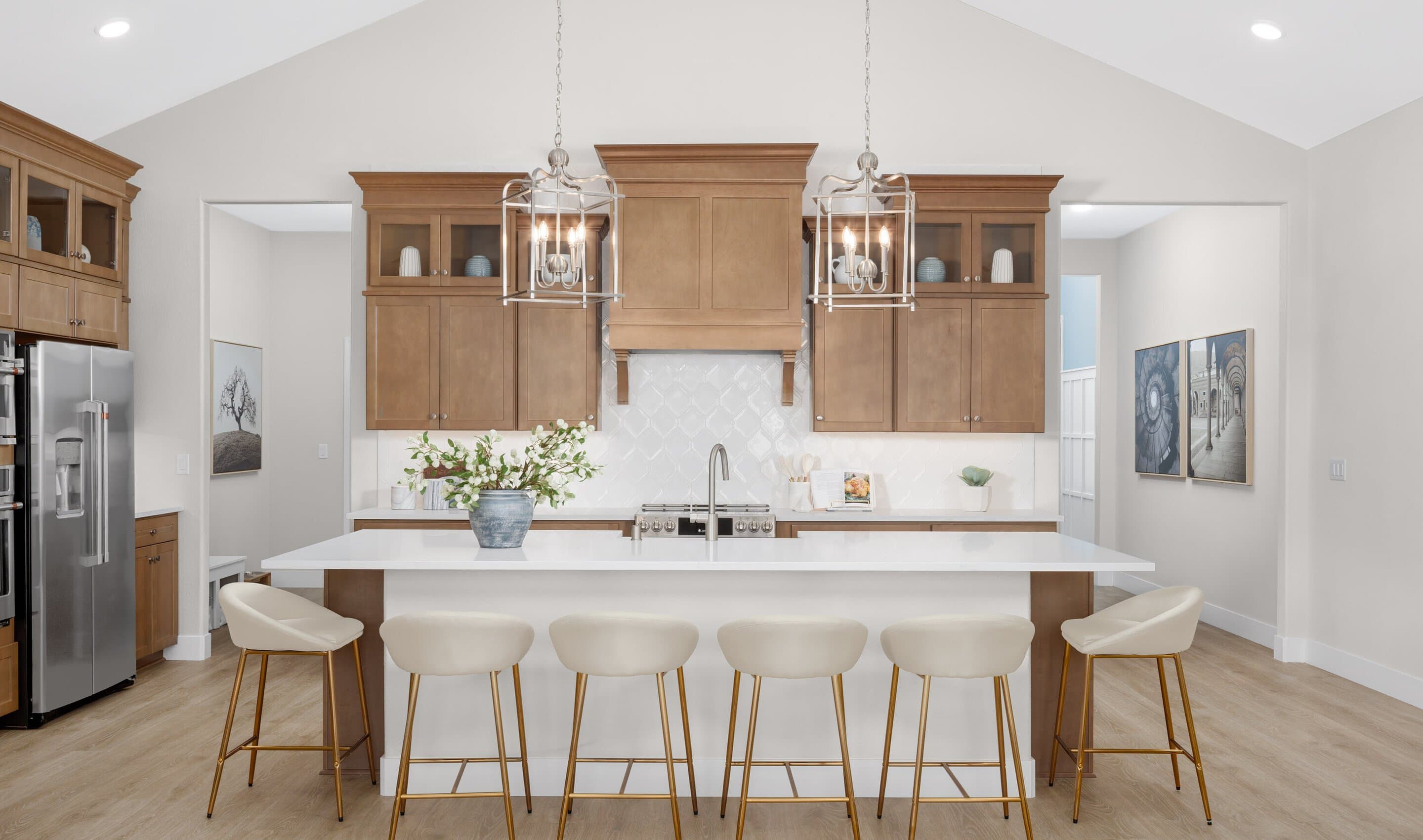 Kitchen with pendant lighting and glass upper cabinets