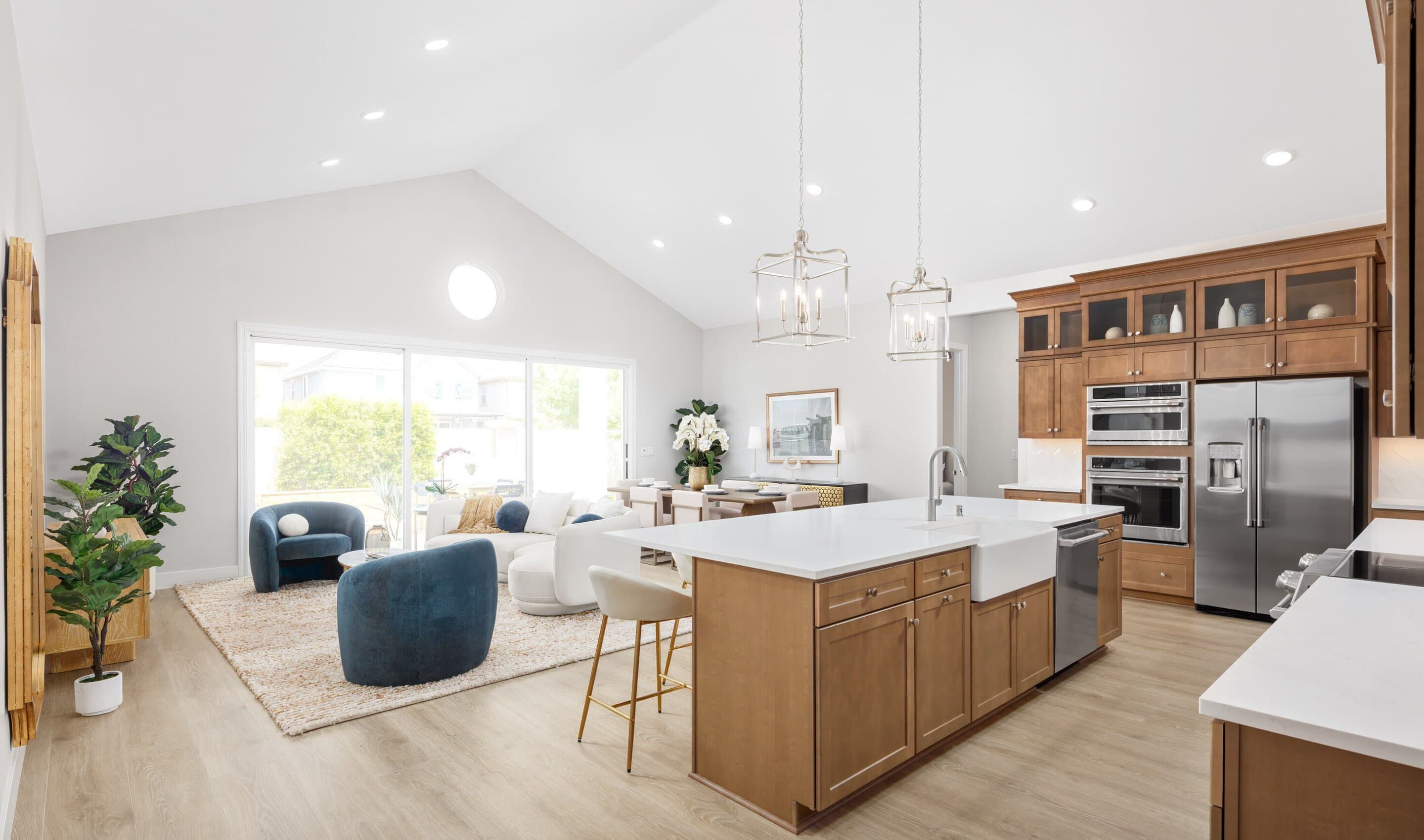 Kitchen overlooking the great room with vaulted ceiling