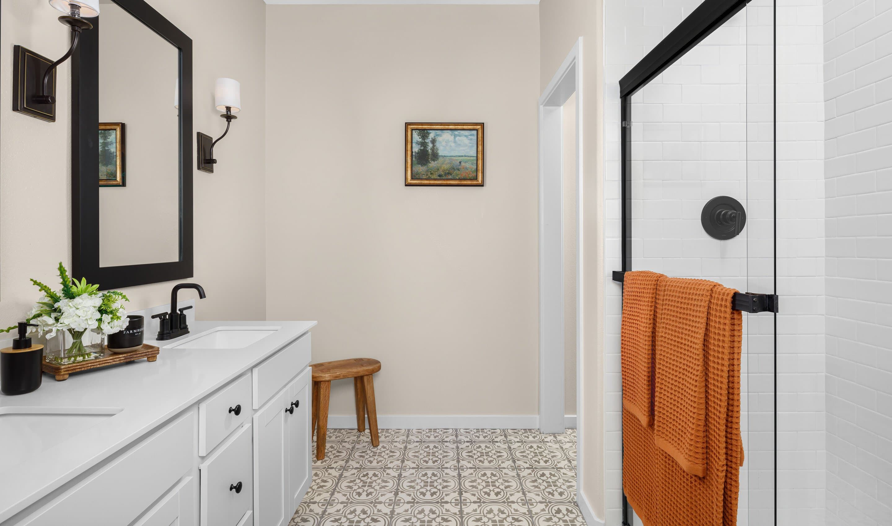 Primary bath with glass shower enclosure
