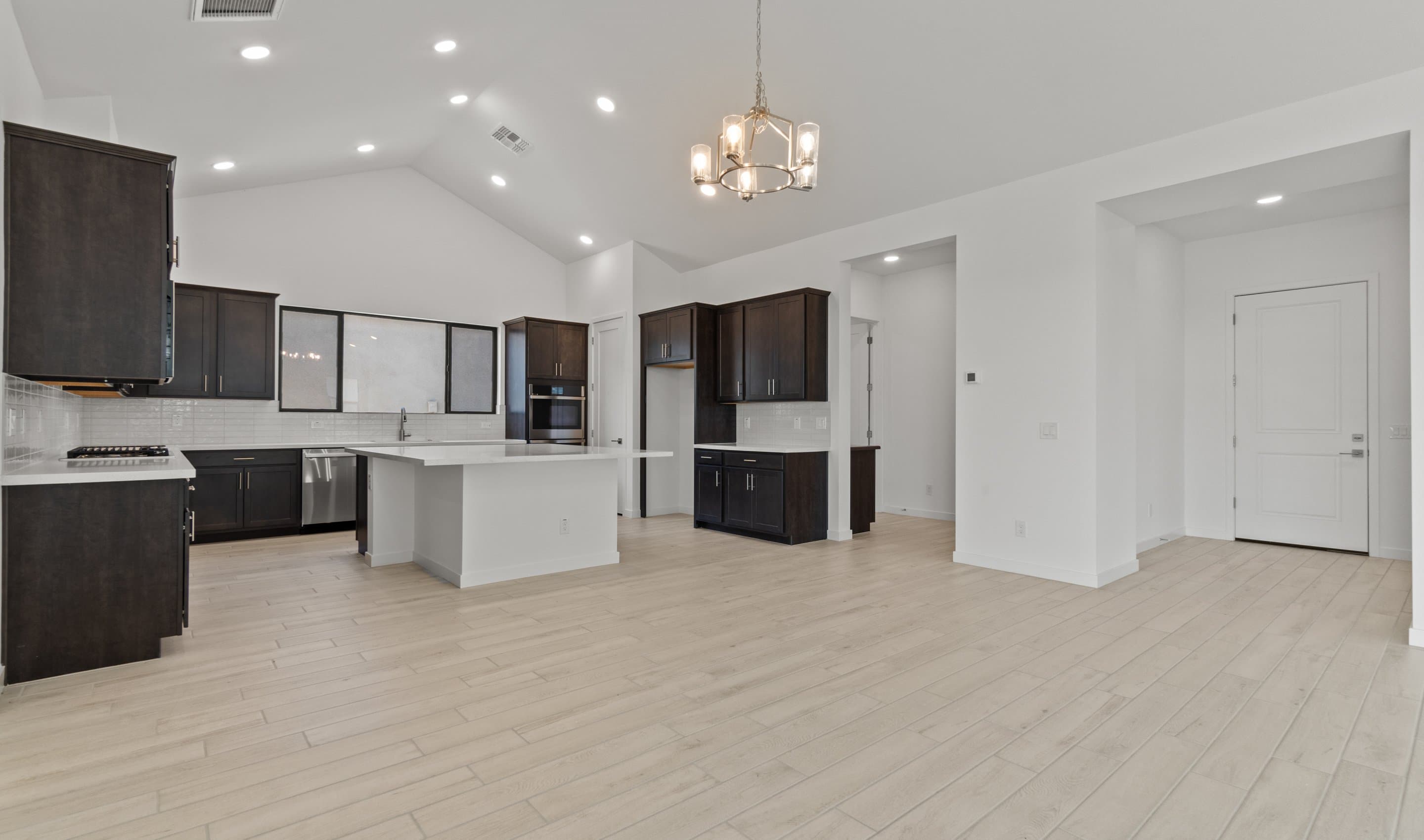 Vaulted ceiling unites main living areas