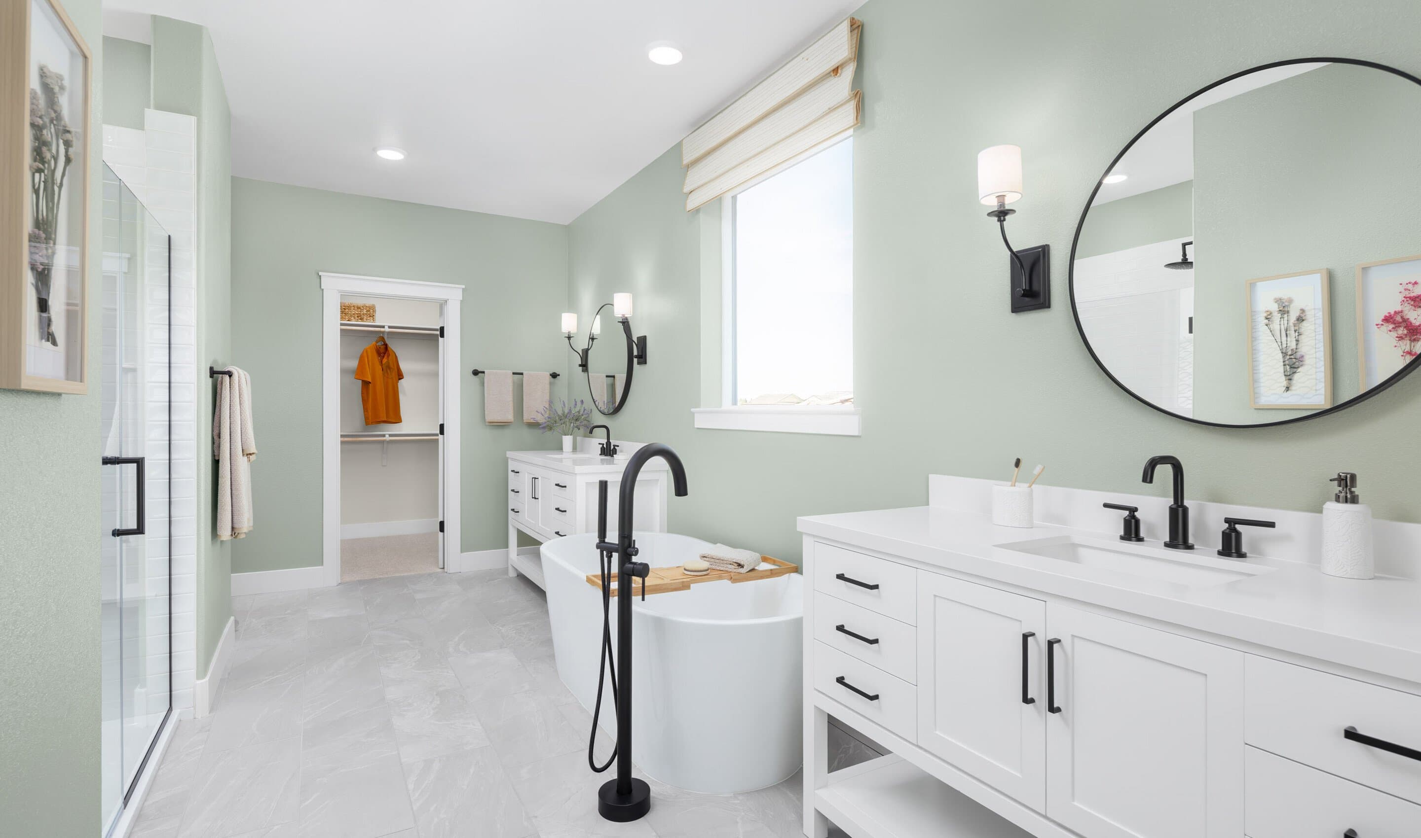 Primary bath with dual vanities and freestanding tub
